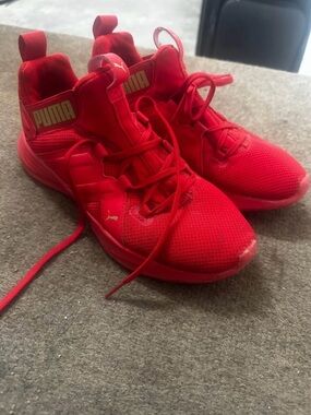 Puma Red Mesh Athletic Trainers with Gold Logo